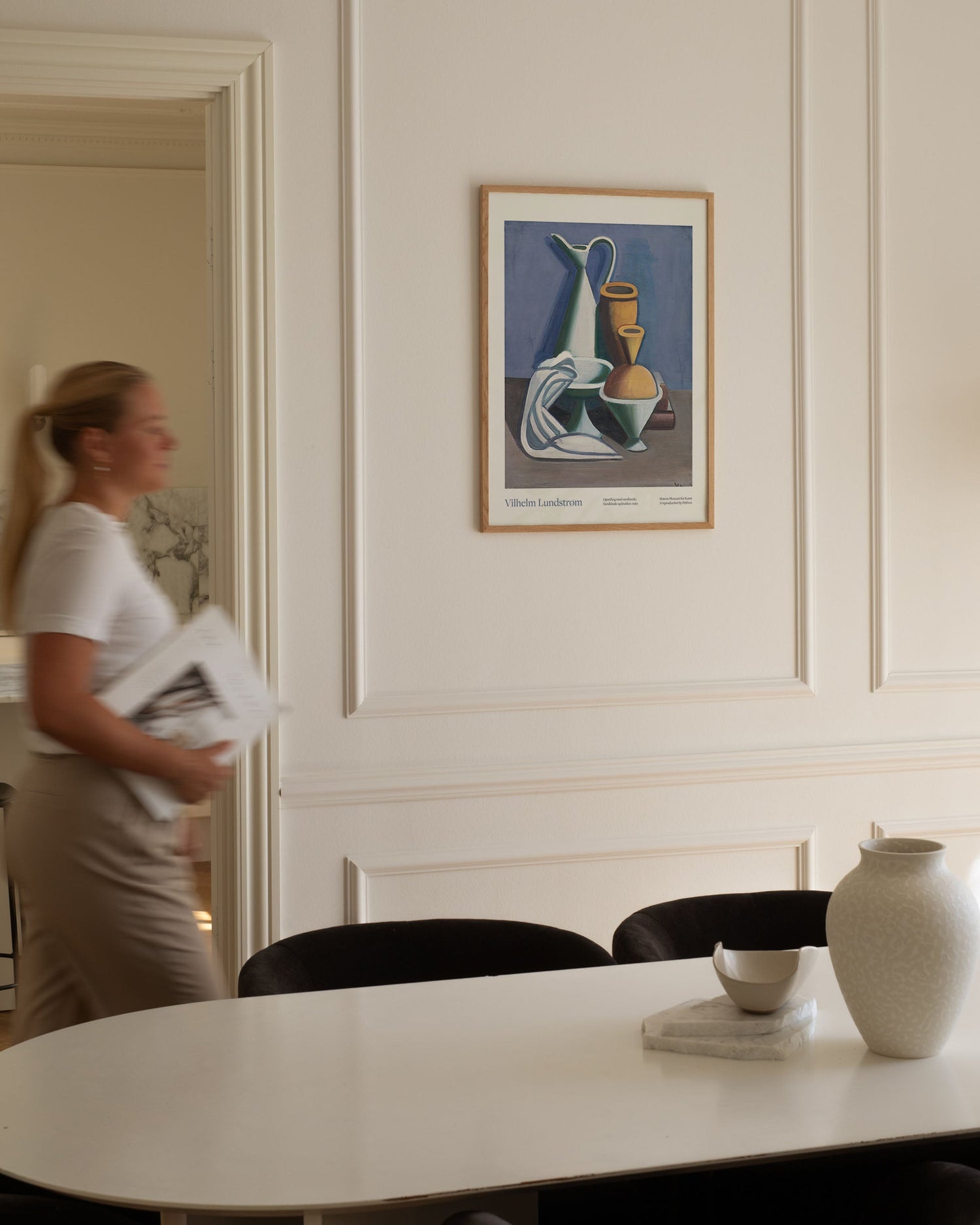 Setup with watering can, towel, and jar