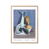 Arrangement with watering can, towel and jar